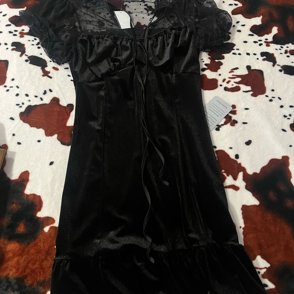 Elegant Black Dress with Sheer Sleeves
